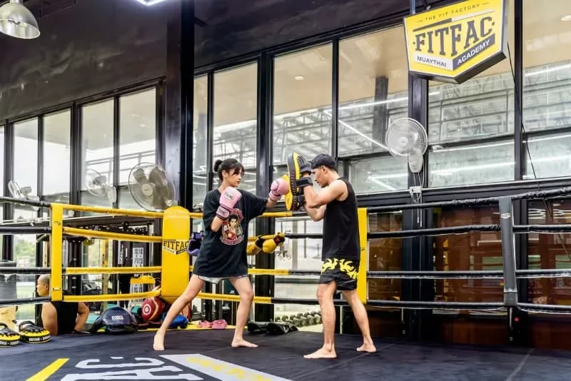 Muay Thai pad work in the ring at FITFAC